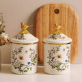 Pote Decorativo – Cerâmica Floral com Tampa Ornamental Dourada